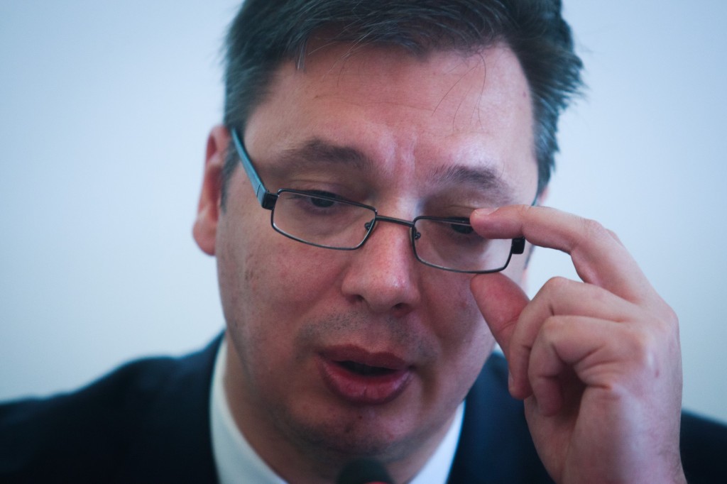Aleksandar Vučić szerb miniszterelnök egy német külügyminiszterrel közös berlini kerekasztalon, ahol a szerb európai uniós csatlakozásról tárgyaltak a szerb kabinet képviselői és német gazdasági szakértők részvételével. Fotó: Theo Schneider, copyright Demotix, June 30, 2014.
